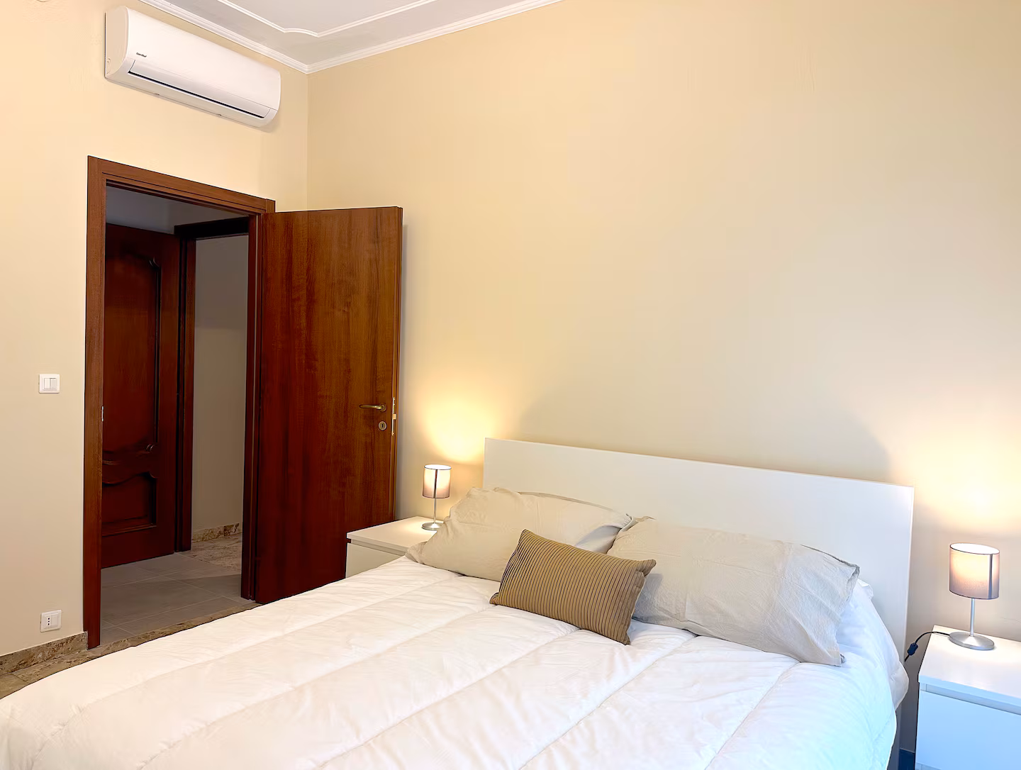 Master bedroom with comfortable bed
